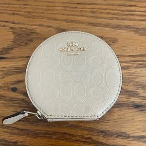 Coach circular coin purse tan like new condition